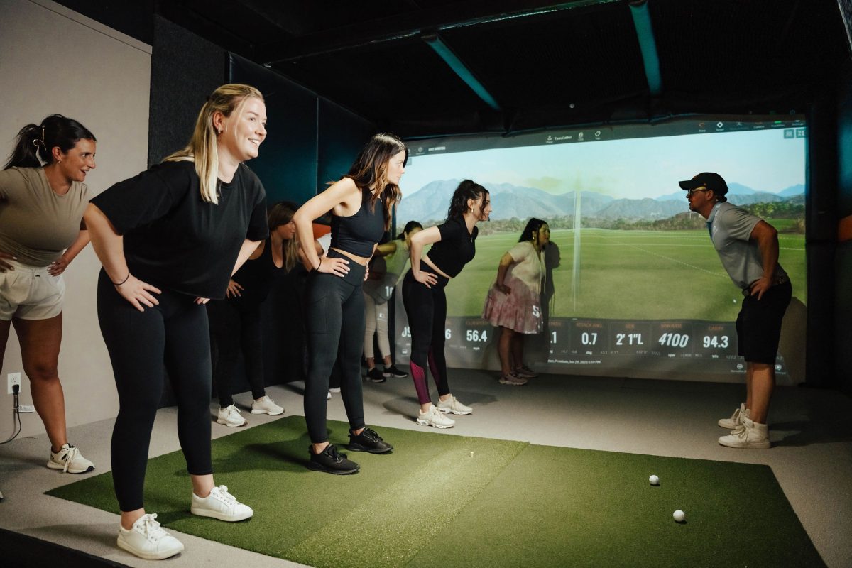 Group golf simulator experience at Hack Shack Manhattan